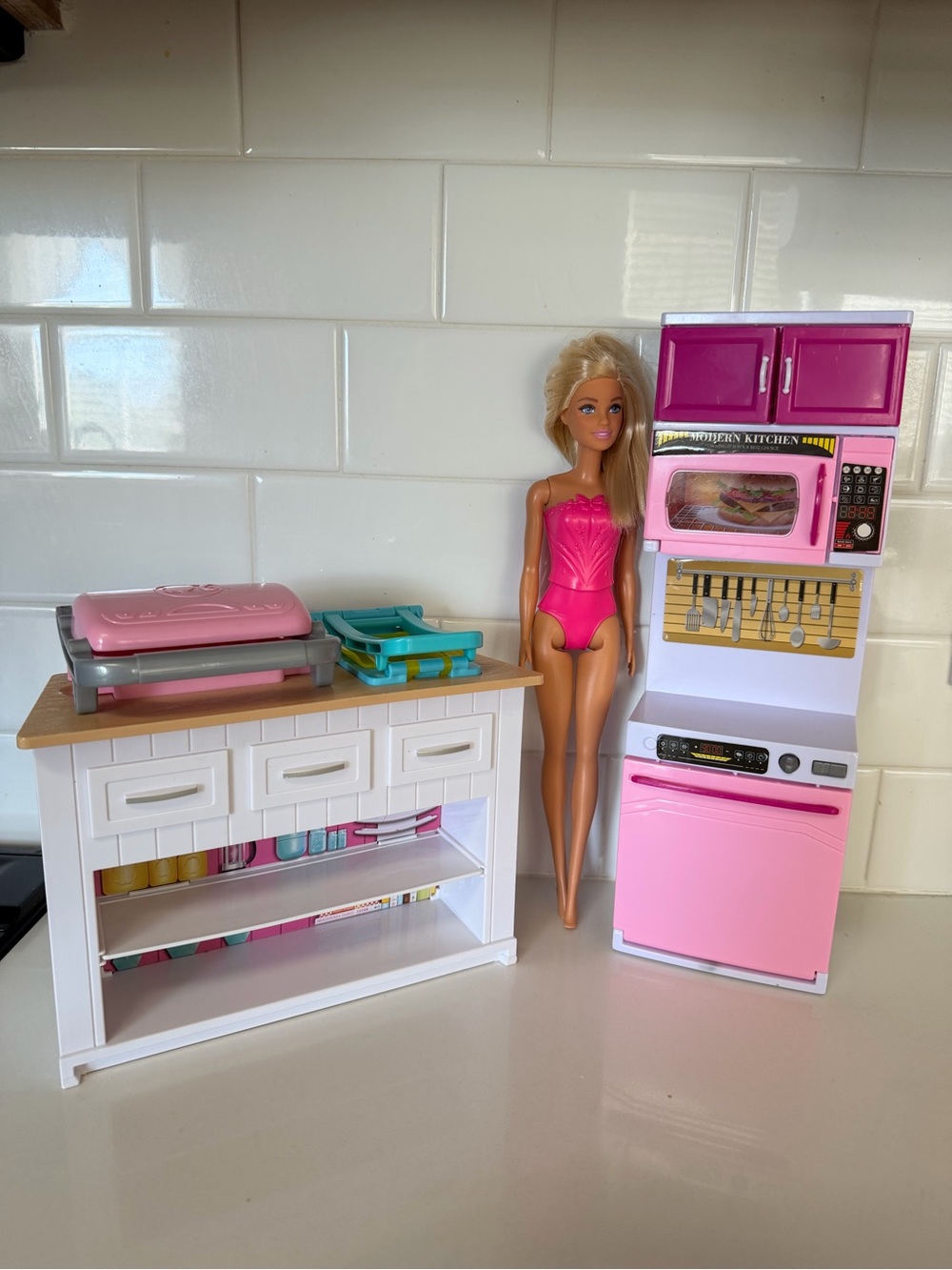 Barbie Doll With Pink and White Kitchen Set